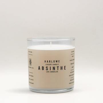 Harlowe Luxury Candle with 'Absinthe' label on a beige background