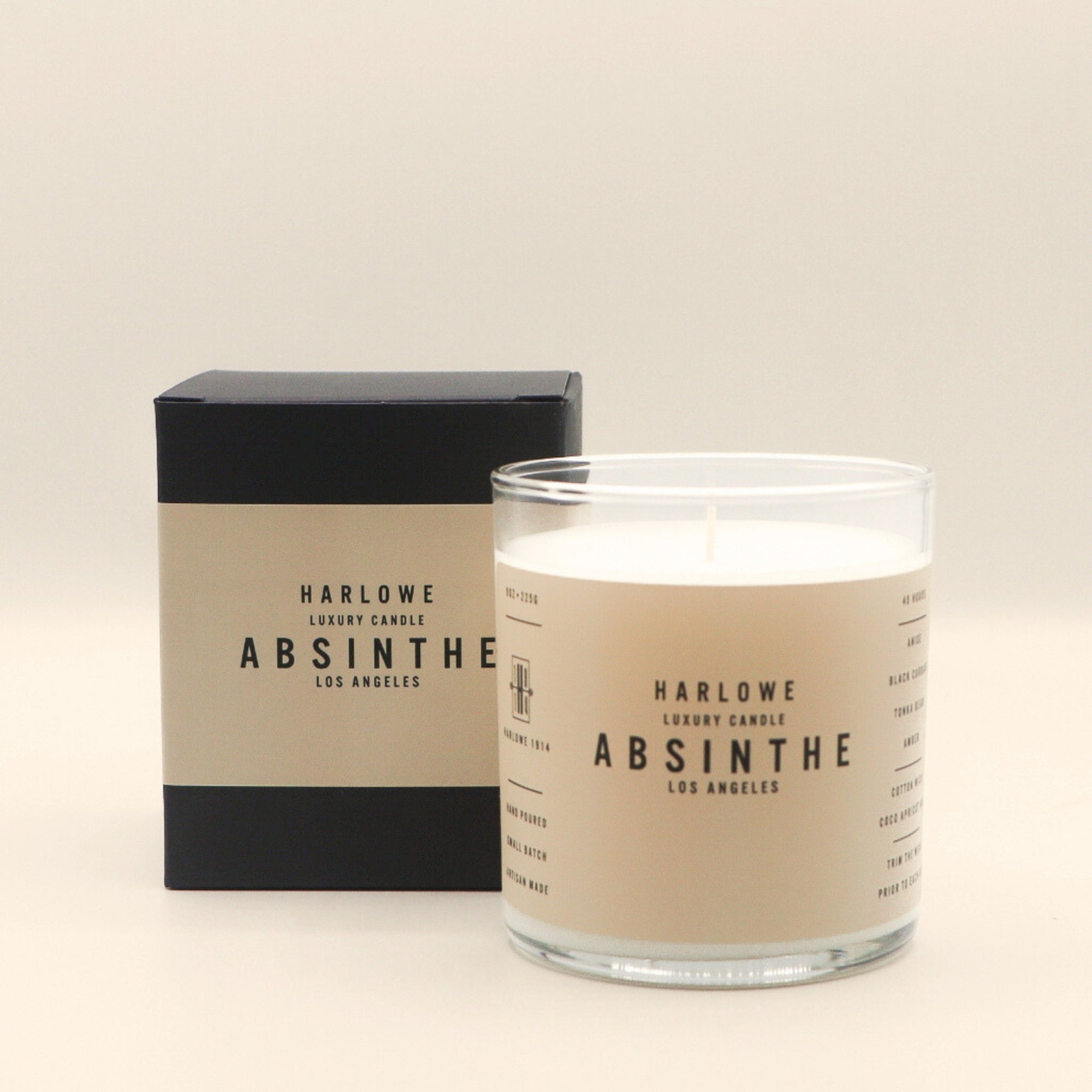 Harlowe Absinthe candle with packaging on a beige background