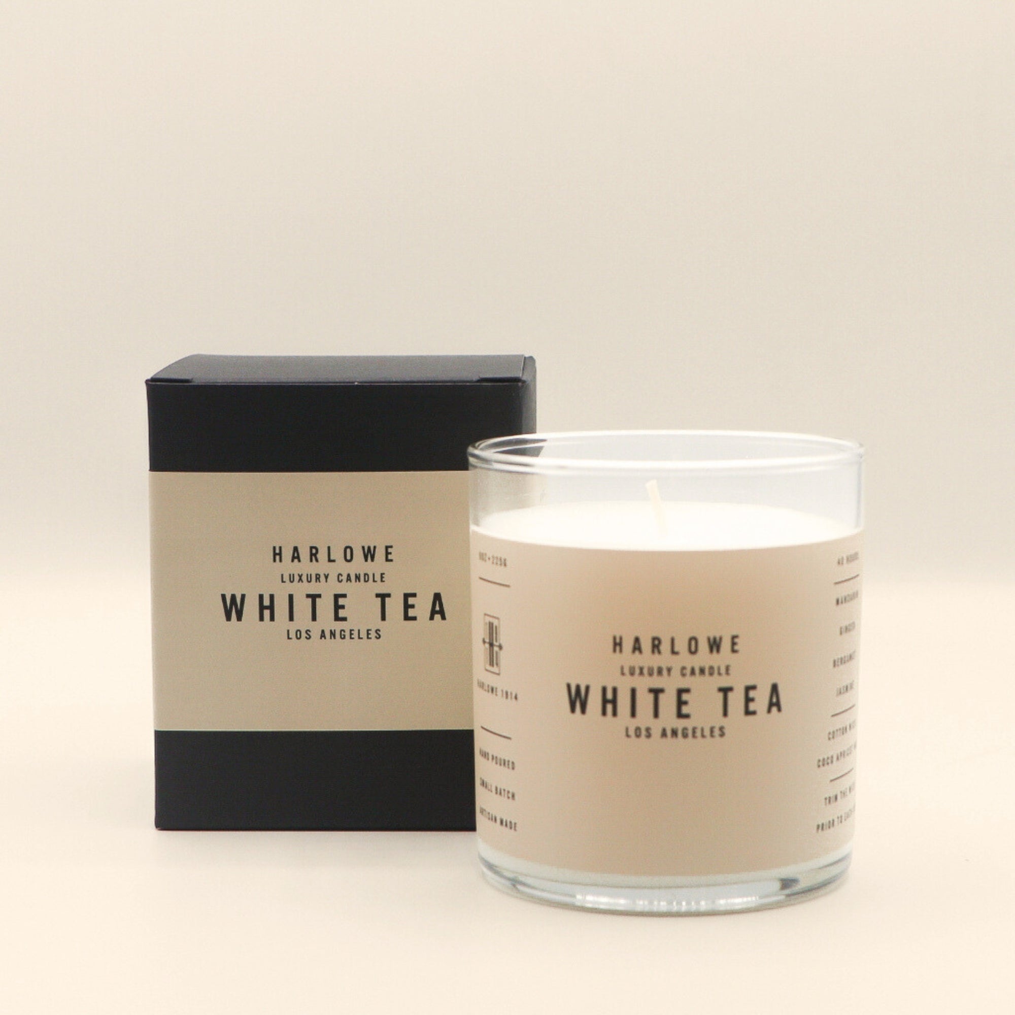 Harlowe White Tea candle and packaging on a beige background