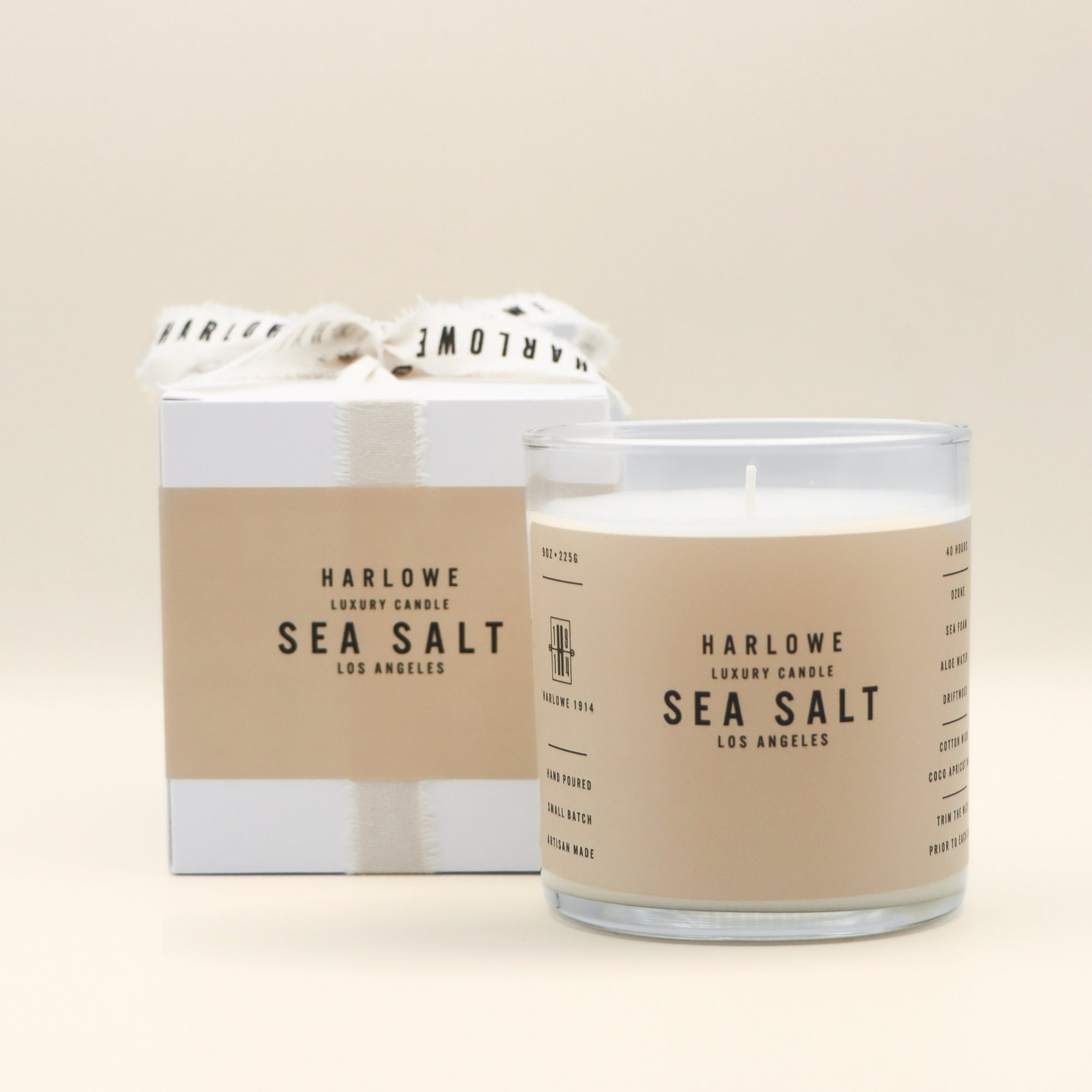 Harlowe Sea Salt candle and packaging on a beige background