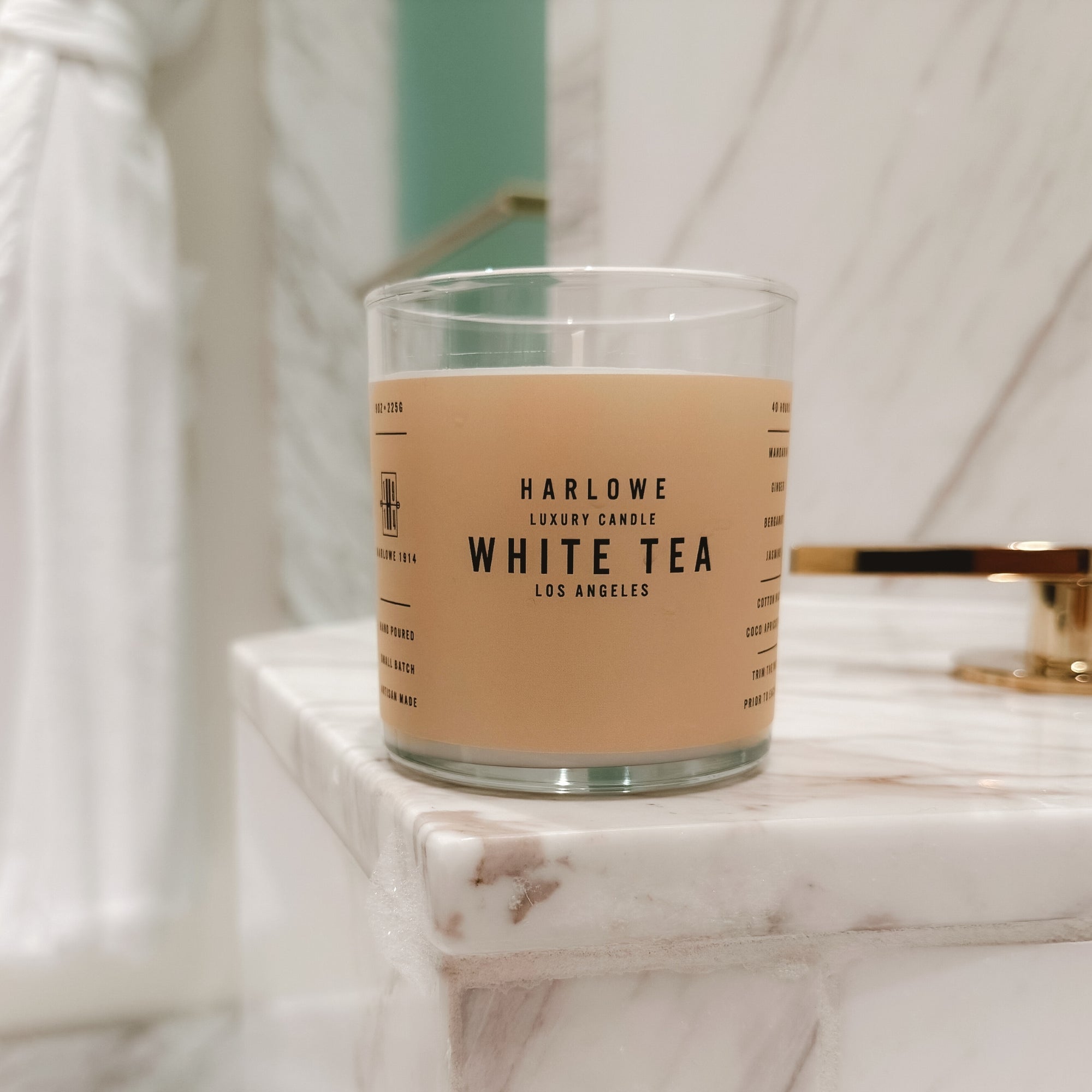 Harlowe Luxury Candle White Tea candle on a marble bathtub
