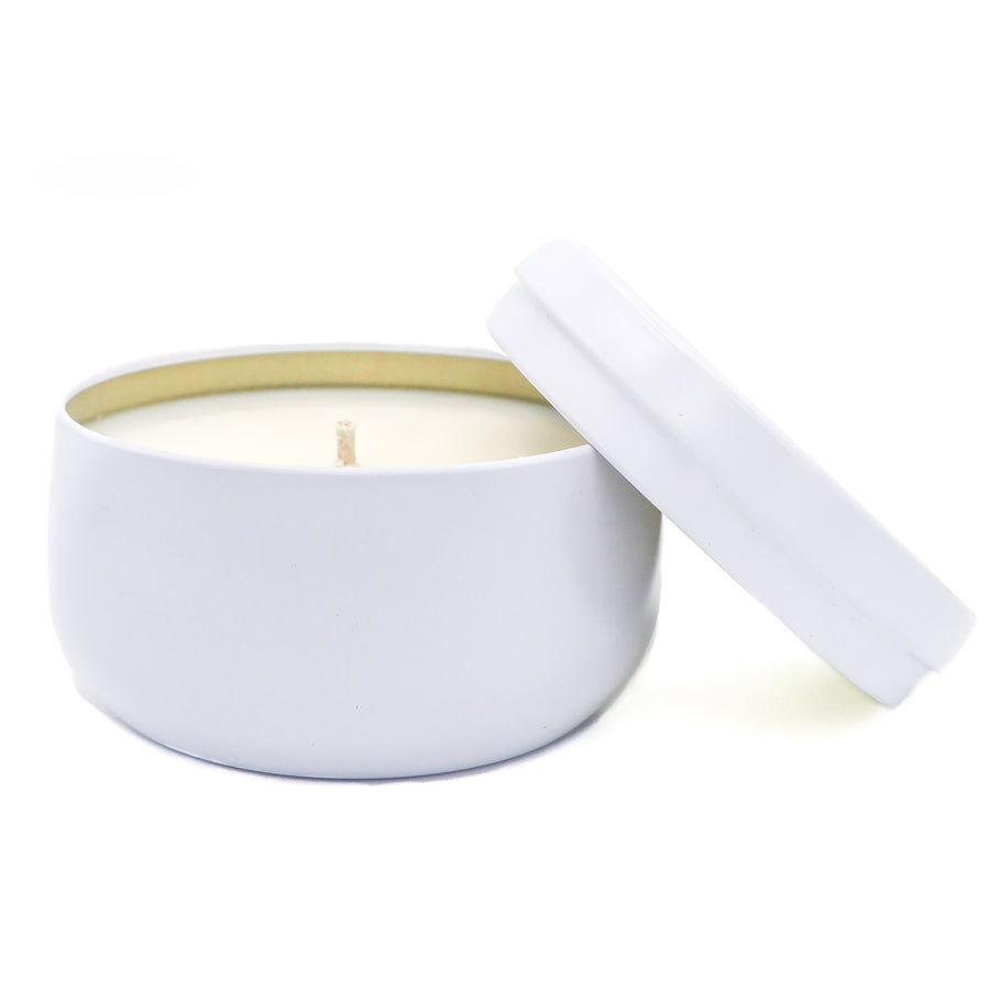 White currant 7 ounce soy candle tin in white.  Harlowe 1914.